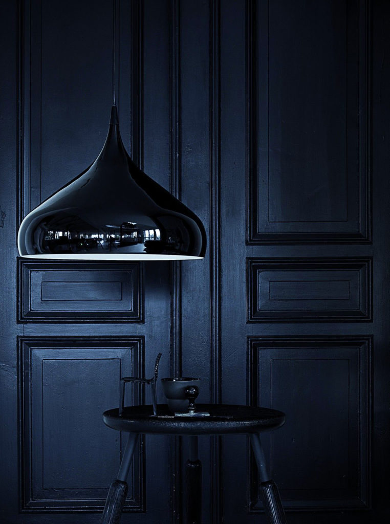 Black lamp in dark interior